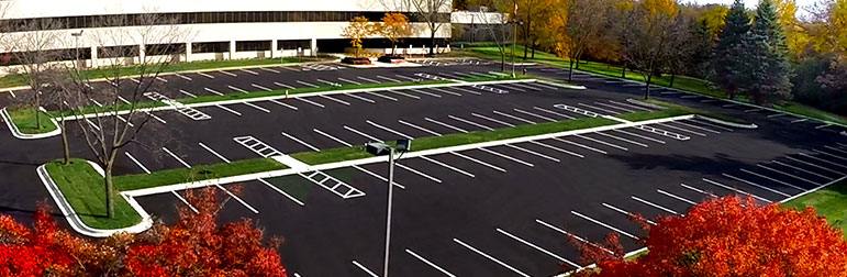 Commercial property parking lot with pavement work planning underway
